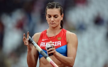 Russia's Yelena Isinbayeva sprays an adh...Russia's Yelena Isinbayeva sprays an adhesive spray on her pole prior to competing in the women's pole vault final at the athletics event of the London 2012 Olympic Games on August 6, 2012 in London. AFP PHOTO / FRANCK FIFEFRANCK FIFE/AFP/GettyImages